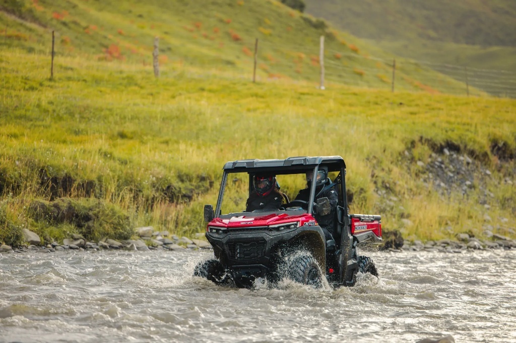 SWM utility UTV crossing a river during outdoor work.jpg